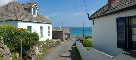 holiday home rental example - white cottage with coastal view