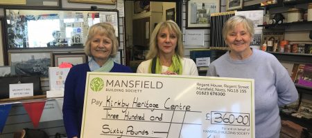 Kirkby Heritage Centre three women holding cheque