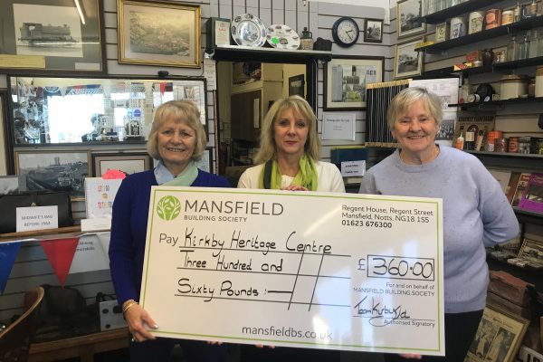 Kirkby Heritage Centre three women holding cheque