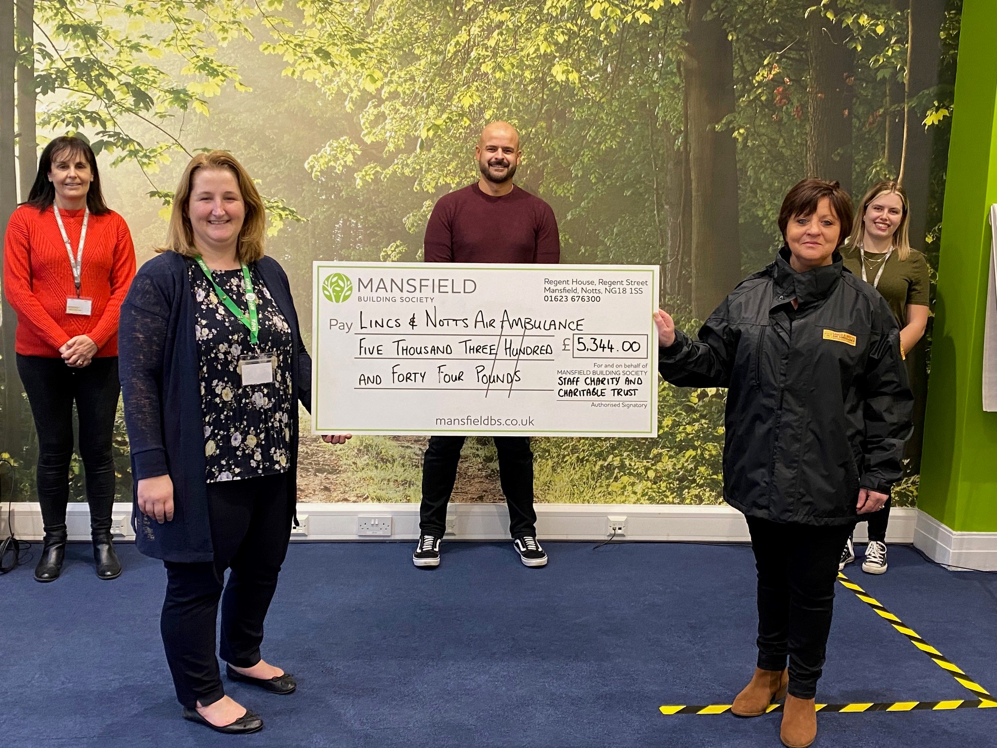 Five people forest backdrop mansfield bs cheque notts air ambulance