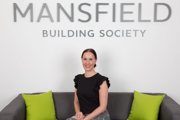 Mansfield Building Society Anna Squires sitting on sofa