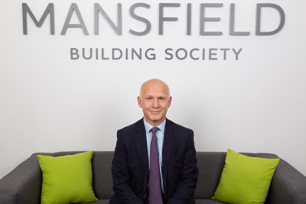 Mansfield Building Society Keith McLeod sitting on sofa