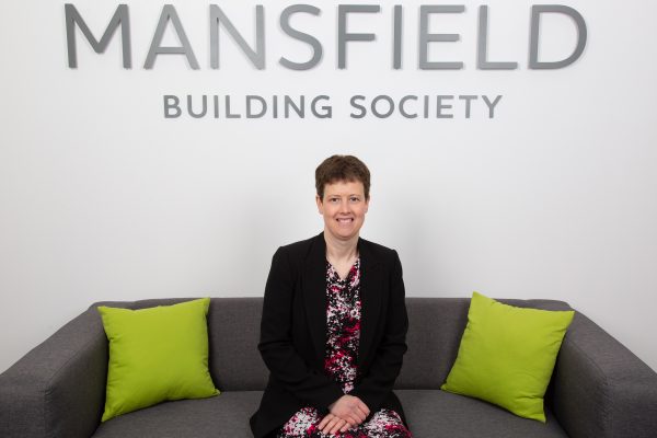 Mansfield Building Society Lucy McClements sitting on sofa