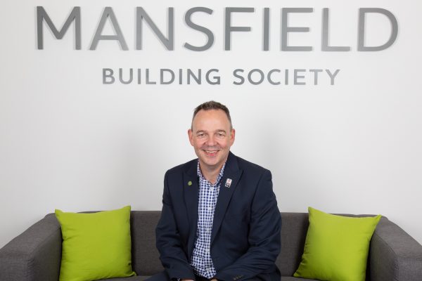 Mansfield Building Society Paul Wheeler sitting on sofa