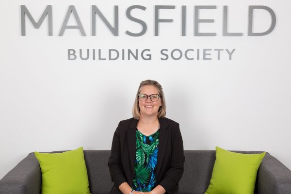Mansfield Building Society Vicki Cook sitting on sofa