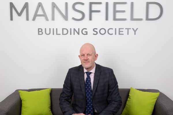 Mansfield Building Society David Newby sitting on sofa