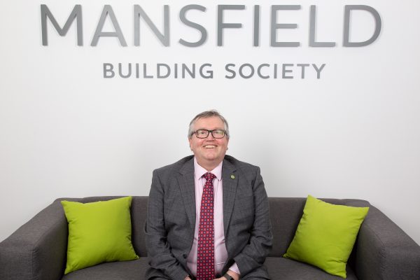 Mansfield Building Society Mike Taylor sitting on sofa