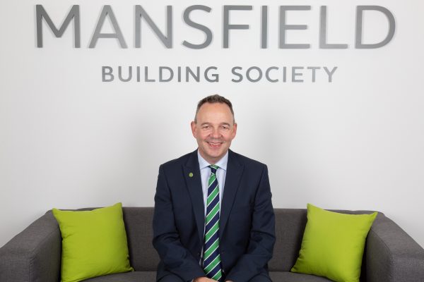 Mansfield Building Society Paul Wheeler sitting on sofa