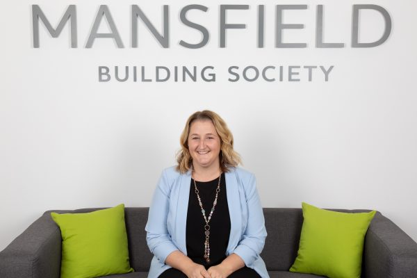 Mansfield Building Society Vickie Preston sitting on sofa