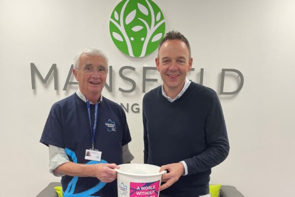 Two men holding bucket - mansfield bs and alzheimers society