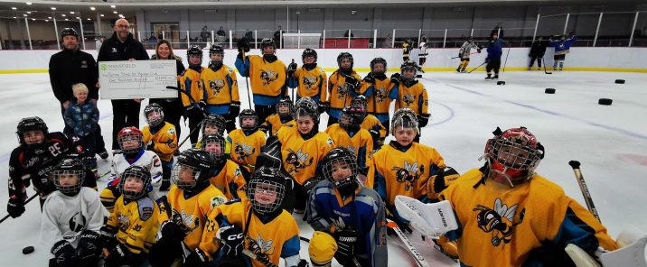 Sutton stings kids hockey team on ice with large cheque