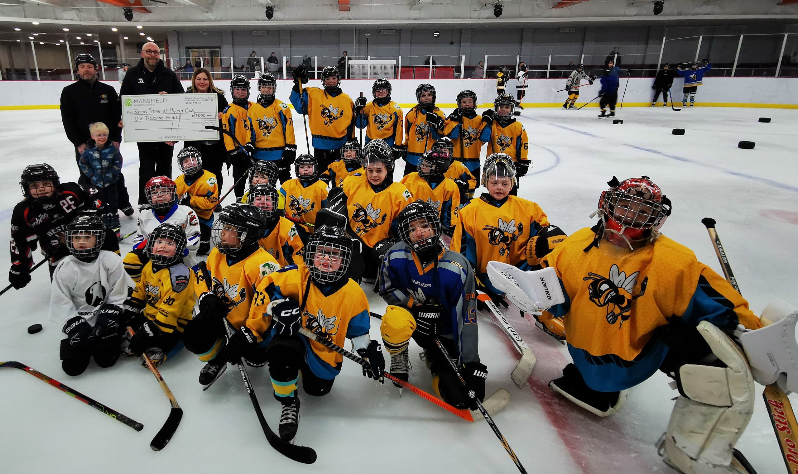 Sutton stings kids hockey team on ice with large cheque