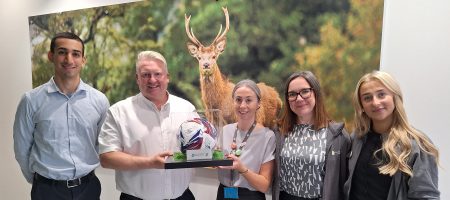 Members of Mansfield Town FC and Mansfield Building Society celebrate the partnership for 2026-27